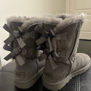 Gray Uggs with bows in back